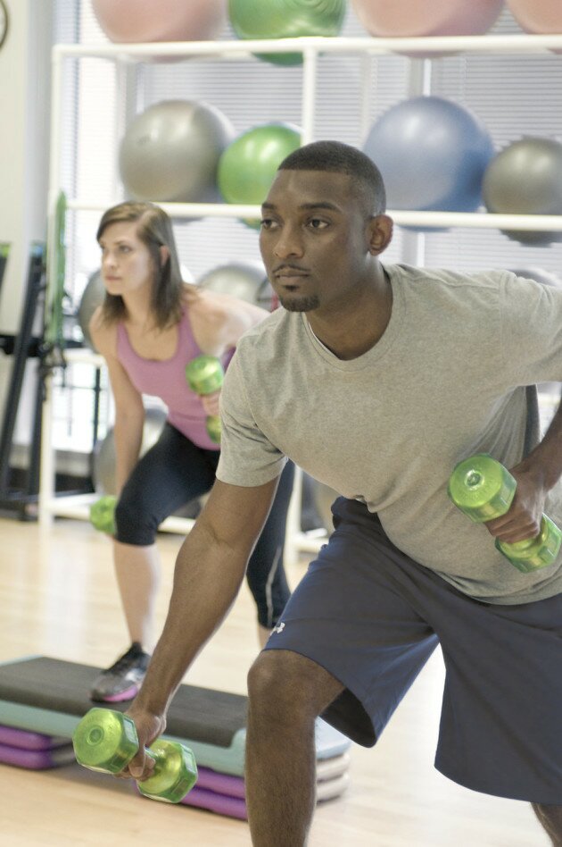 17364-men-and-women-performing-aerobic-exercises-pv